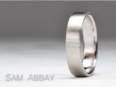Platinum and Gold Wedding Rings with Inlay