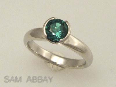 emerald solitaire engagement ring