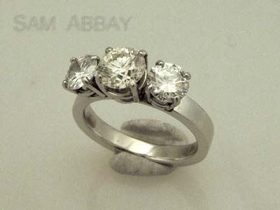 platinum three diamond engagement ring