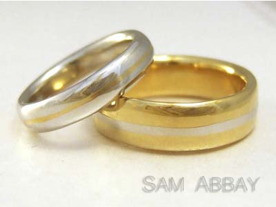 Platinum and Gold Wedding Rings with Inlay